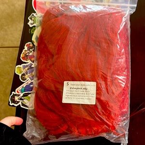 Diluc wig, never worn.